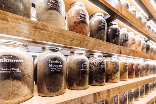 Hundreds of jars of soil from documented lynching sites at the new Legacy Museum, part of the National Memorial for Peace and Justice in Montgomery, Ala., April 20, 2018. Dedicated to the victims of American white supremacy, the site demands a reckoning with with the lynching of thousands of black people in a decades-long campaign of racist terror. (Audra Melton/The New York Times)