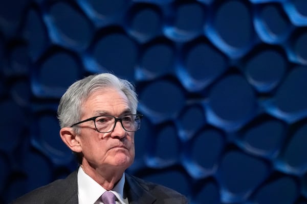 Federal Reserve Chair Jerome Powell listens to a question from the moderator on the stage during a Dallas Regional Chamber event in Music Hall at Fair Park Thursday, Nov. 14, 2024, in Dallas. (AP Photo/LM Otero)