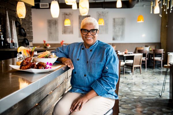 Twisted Soul chef/owner Deborah VanTrece prepares Sweet Tea Ribs, Southern Mediterranean Salad and Moonshine Flight. (Mia Yakel)