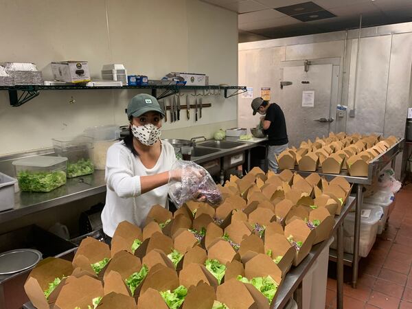 The kitchen at Tuk Tuk Thai Food Loft prepares orders for Feed the Frontline. Courtesy of Tamarind Restaurant Group 