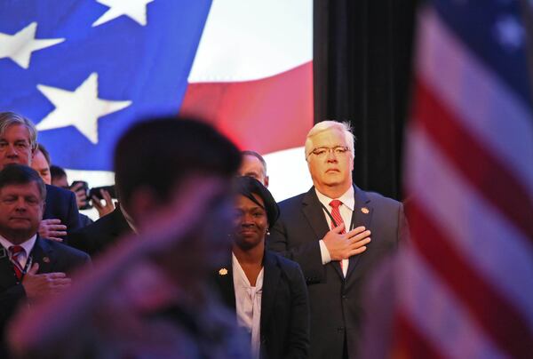 Cobb Commission Chairman Tim Lee listens to the national anthem at the official groundbreaking ceremony in 2014 for the new Cobb County home of the Braves. (AJC file photo)