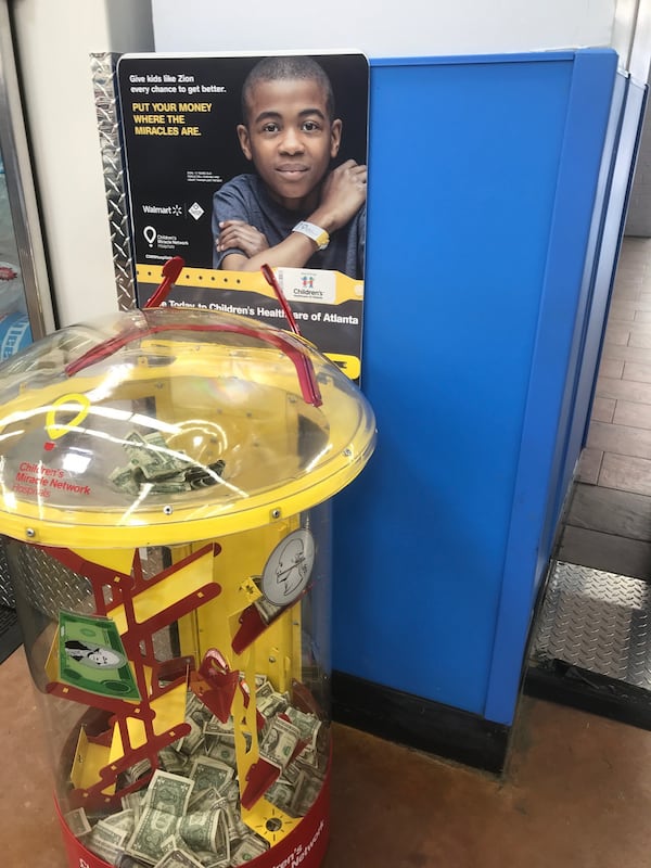 Donation stations for Children’s fund-raising campaigns are common sights in shopping areas throughout the metro area. However, every health care finance expert who spoke to the AJC for this article concluded the system, as a not-for-profit, provided very little charity care when compared to its vast wealth. (Contributed)