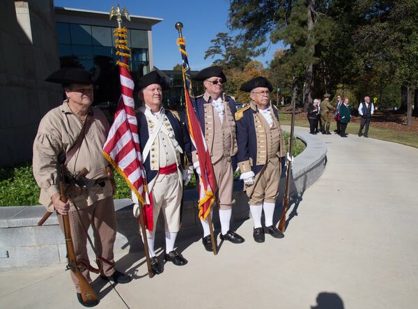 Georgia Society Sons of the American Revolution wait to present the colors before the start of the 2018 Veterans Day Commemoration at the Atlanta History Center  on Sunday, November 11, 2018.  This year's ceremony recognized the 100th anniversary of the end of World War I. (Photo: STEVE SCHAEFER / SPECIAL TO THE AJC)