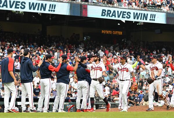 Braves players celebrate their victory over Washington Nationals at Truist Park on Saturday, July 9, 2022. Atlanta Braves won 4-3 over Washington Nationals. (Hyosub Shin / Hyosub.Shin@ajc.com)