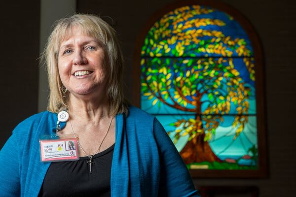 Portrait of Faith Community Nurse Lori Floyd in the chapel at Gwinnett Medical Center in Lawrenceville. (Photo by Phil Skinner)