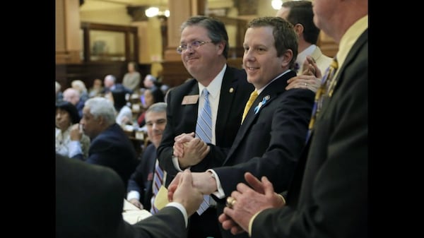 2/1/18 - Atlanta - Rep. Bert Reeves, R - Marietta, is congratulated after the passage of HB159, concerning adoption, in the House. BOB ANDRES /BANDRES@AJC.COM