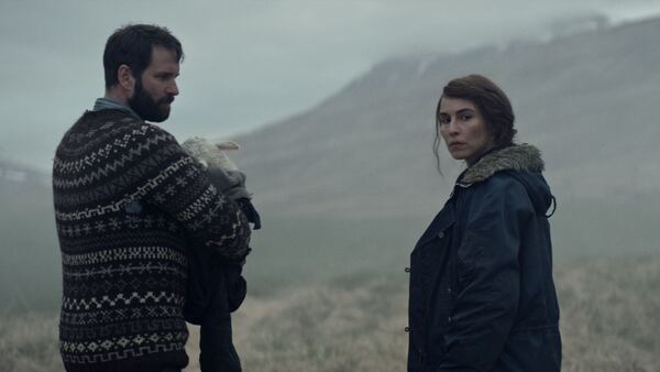 Hilmir Snær Guðnason and Noomi Rapace star as parents living in remote Iceland who adopt a lamb as their own in the horror fantasy "Lamb."
Courtesy of A24