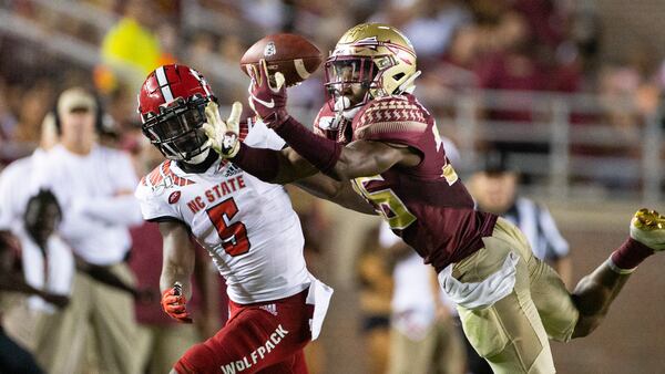 Florida State Seminoles defensive back Asante Samuel Jr. (26) tries to intercept a pass intended for North Carolina State wide receiver Tabari Hines (5) on Saturday, Sept. 28, 2019, in Tallahassee, Fla. (Mark Wallheiser/AP)