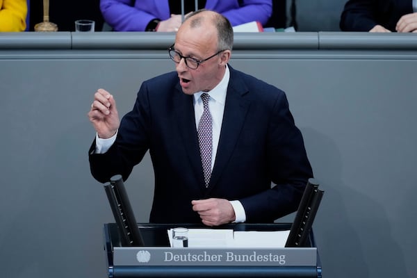 German opposition leader and Christian Democratic Union party chairman Friedrich Merz speaks during a debate and voting about loosen the country's debt rules and change constitution in the German Parliament Bundestag in Berlin, Germany, Tuesday, March 18, 2025. (AP Photo/Ebrahim Noroozi)