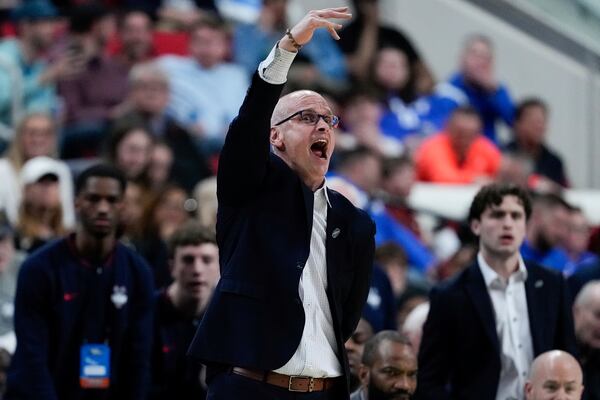 UConn head coach Dan Hurley directs during the first half in the first round of the NCAA college basketball tournament against Oklahoma, Friday, March 21, 2025, in Raleigh, N.C. (AP Photo/Stephanie Scarbrough)