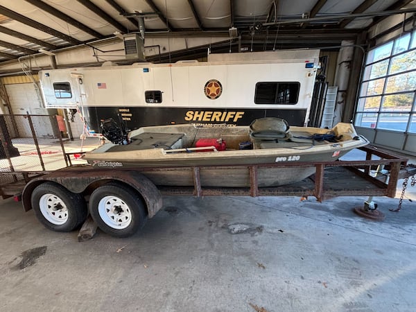 The boat that Gary Jones and Joycelyn Nicole Wilson took out onto Lake Oconee on Feb. 8 is shown stored in a shelter at the Putnam County Sheriff's Office in Eatonton in this image provided by the sheriff's office.