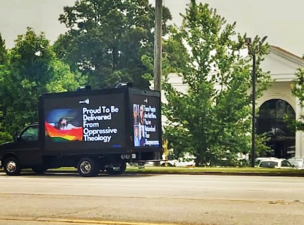 A billboard truck driven by GLAAD volunteers features pro-LGBTQ+ messaging in protest of a Marietta church's anti-LGBTQ+ billboards on Sunday, June 18, 2023. Photo provided by GLAAD