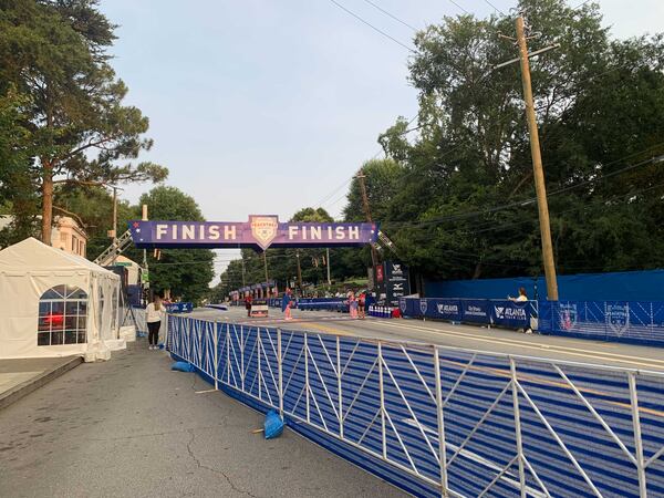 Waiting for the first finishers of this year's Atlanta Journal-Constitution Peachtree Road Race on Saturday morning, July 3, 2021. (Photo: Caroline Silva/AJC)