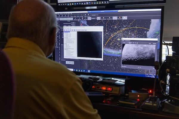 Tom Crowley operates a telescope located in Hawaii from his home in Park Springs Life Plan Community in Stone Mountain. PHIL SKINNER FOR THE ATLANTA JOURNAL-CONSTITUTION