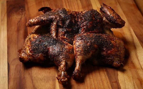 After final roasting, the chicken emerges with crispy, nicely browned skin. (Lisa Schumacher/food styling) (E. Jason Wambsgans/Chicago Tribune/TNS)