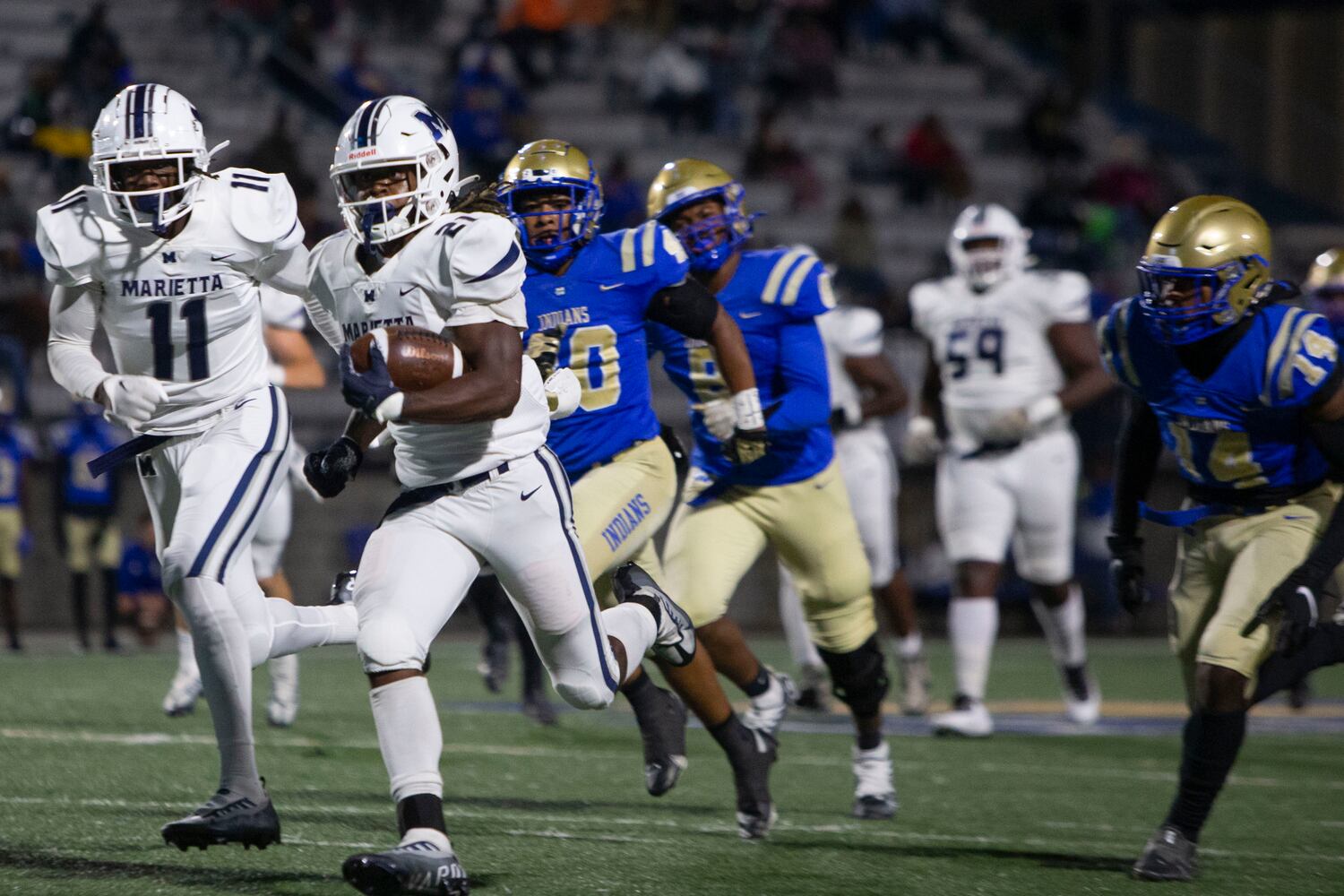 Jace Arnold heads toward the endzone on his touchdown run during the Marietta vs. McEachern High School Football game on Friday, October 14, 2022, at McEachern High School in Powder Springs. (Christina Matacotta for the AJC)