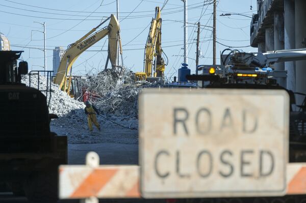 Demolition continues on the section of I-85 in Atlanta that collapsed in a fire on March 30, 2017. (DAVID BARNES / DAVID.BARNES@AJC.COM)