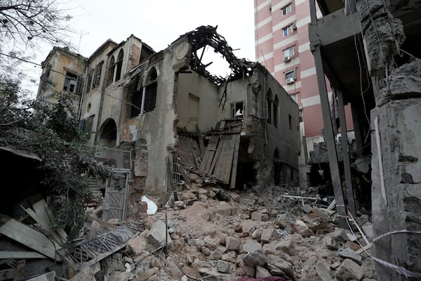 A destroyed building hit on Monday evening by an Israeli airstrike is seen in central Beirut, Lebanon, Tuesday, Nov. 19, 2024. (AP Photo/Bilal Hussein)