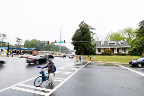 Cars and pedestrians pass by the historic home McAfee located at the intersection of Bells Ferry and Barrett Parkway in Marietta every day, for many it goes unnoticed, but others like Trevor Beemon (not pictured), head of Cobb Landmarks and Historical Society, are making efforts to preserve it.
Miguel Martinez /miguel.martinezjimenez@ajc.com