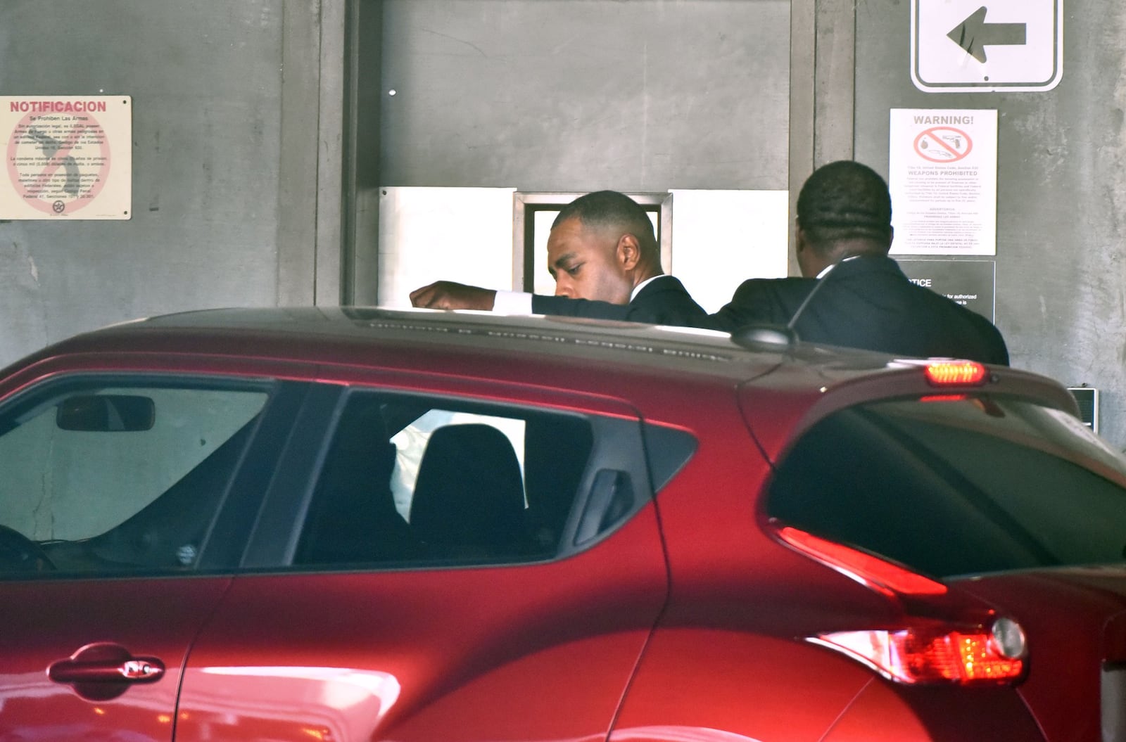 September 26, 2017 Atlanta - Former chief purchasing officer Adam Smith, left, leaves the federal courthouse after pleading guilty in the Atlanta City Hall bribery investigation on Tuesday, September 26, 2017. HYOSUB SHIN / HSHIN@AJC.COM