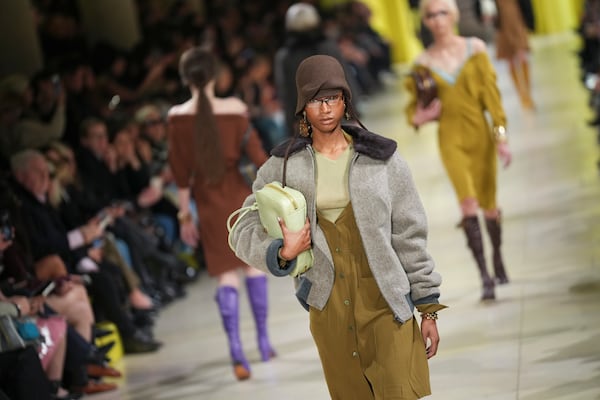 A model wears a creation as part of the Miu Miu Fall/Winter 2025-2026 Womenswear collection presented Tuesday, March 11, 2025. in Paris. (Photo by Scott A Garfitt/Invision/AP)