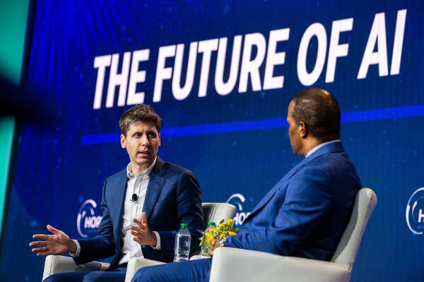 231211 ATLANTA, GA — From left, OpenAI CEO Sam Altman and founder and CEO of Operation HOPE John Hope Bryant speak at the HOPE Global Forums at the Hyatt Regency in downtown Atlanta on Monday, Dec. 11, 2023. 
(Bita Honarvar for The Atlanta Journal-Constitution)