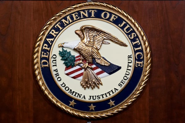 FILE - The seal of the Department of Justice is pictured, Aug. 1, 2023, in Washington. (AP Photo/J. Scott Applewhite, File)