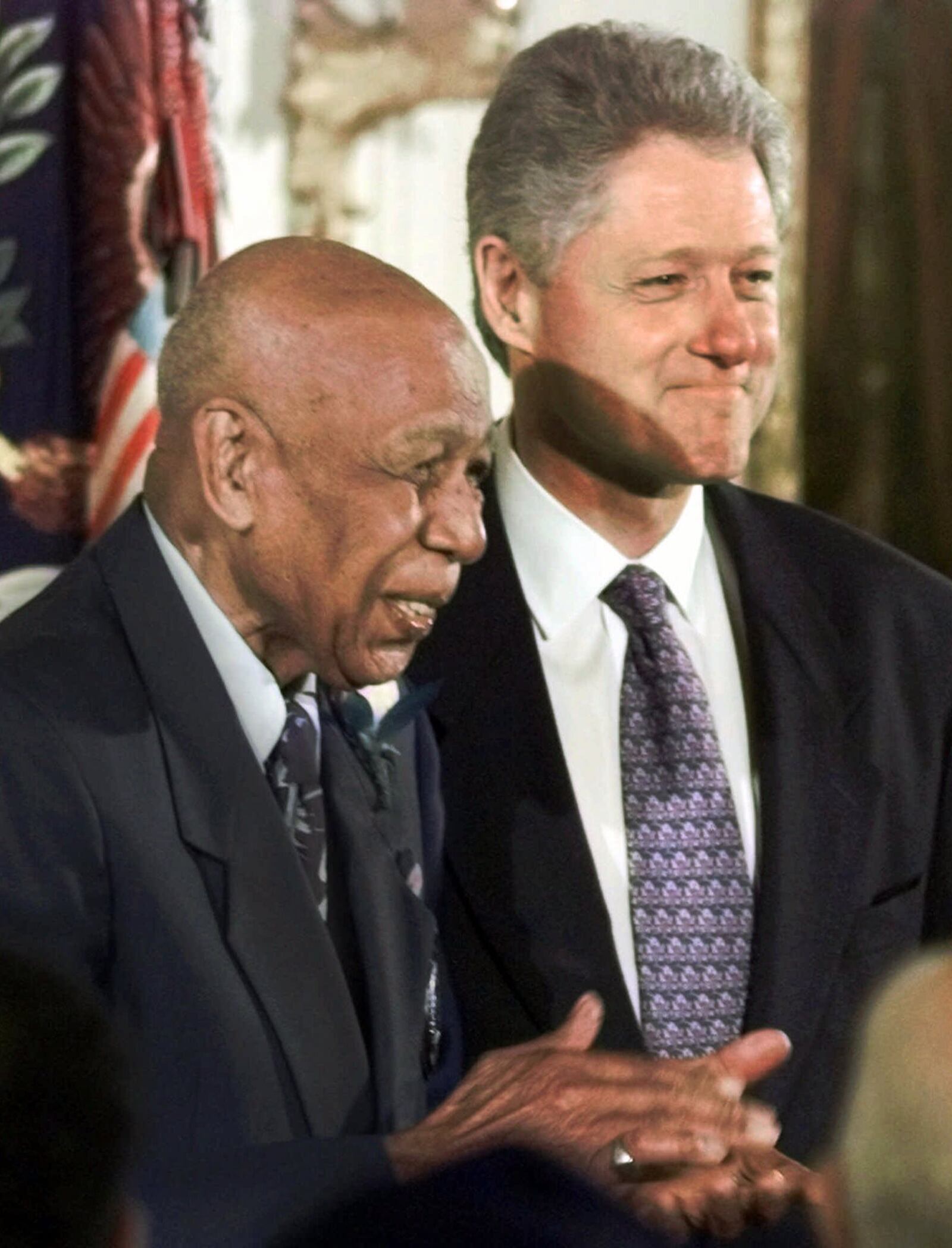 Herman Shaw, a Tuskegee Syphillis Study victim, smiles after receiving an official apology from President Bill Clinton in 1997. Associated Press