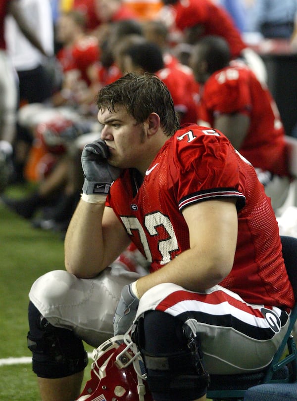 Georgia's Daniel Inman can only watch the final seconds of the Bulldogs' loss to LSU in the SEC  Championship game at the Georgia Dome on Saturday, Dec. 6, 2003. (Brant Sanderlin/AJC file)