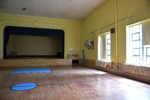 The old gymnasium/auditorium will be renovated into a performance space. KENT D. JOHNSON/KDJOHNSON@AJC.COM