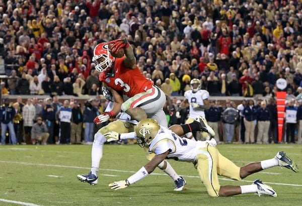 Todd Gurley scores the winner in double OT versus Tech. (Jason Getz/AJC)