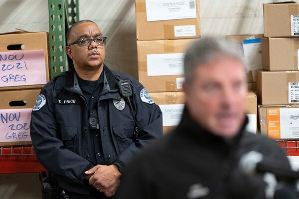 Assistant Chief of Police for the Vancouver Police Department Troy Price, listens during a news conference at the Multnomah County Elections Division office on Monday, Oct. 28, 2024, in Portland, Ore. (AP Photo/Jenny Kane)