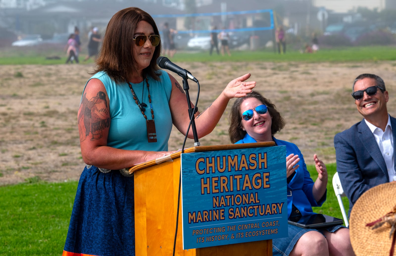 Northern Chumash Tribal Council Chairwoman Violet Sage Walker giving remarks, to her right NOAA Assistant Administrator Nicole LeBoeuf, and California Natural Resources Secretary Wade Crowfoot in Pismo Beach, Calif. on Monday, October. 14, 2024. (Robert Schwemmer via AP)