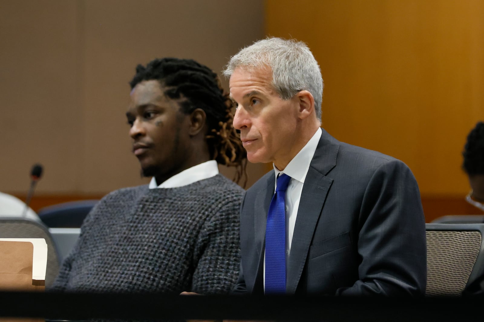 FILE - Young Thug, whose real name is Jeffery Lamar Williams, and his lawyer, Brian Steel, watch Judge Ural Glanville speak during the hearing of key witness Kenneth Copeland at the Fulton County Superior Court in Atlanta on June 10, 2024. (Miguel Martinez/Atlanta Journal-Constitution via AP, File, File)