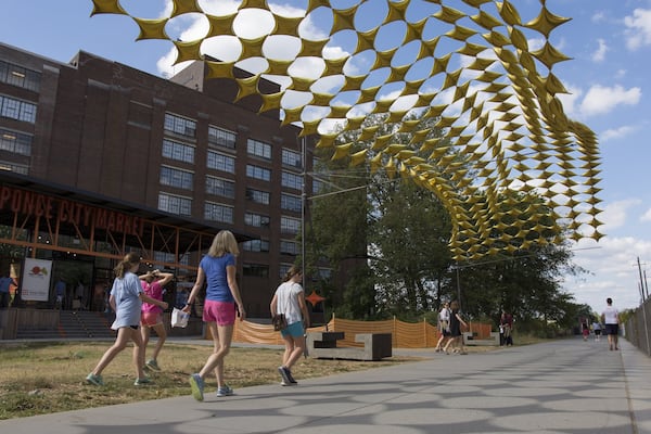 Visitors walk along the Atlanta Beltline at Ponce City Market in Atlanta, on Monday, October 17, 2016. (DAVID BARNES / DAVID.BARNES@AJC.COM)