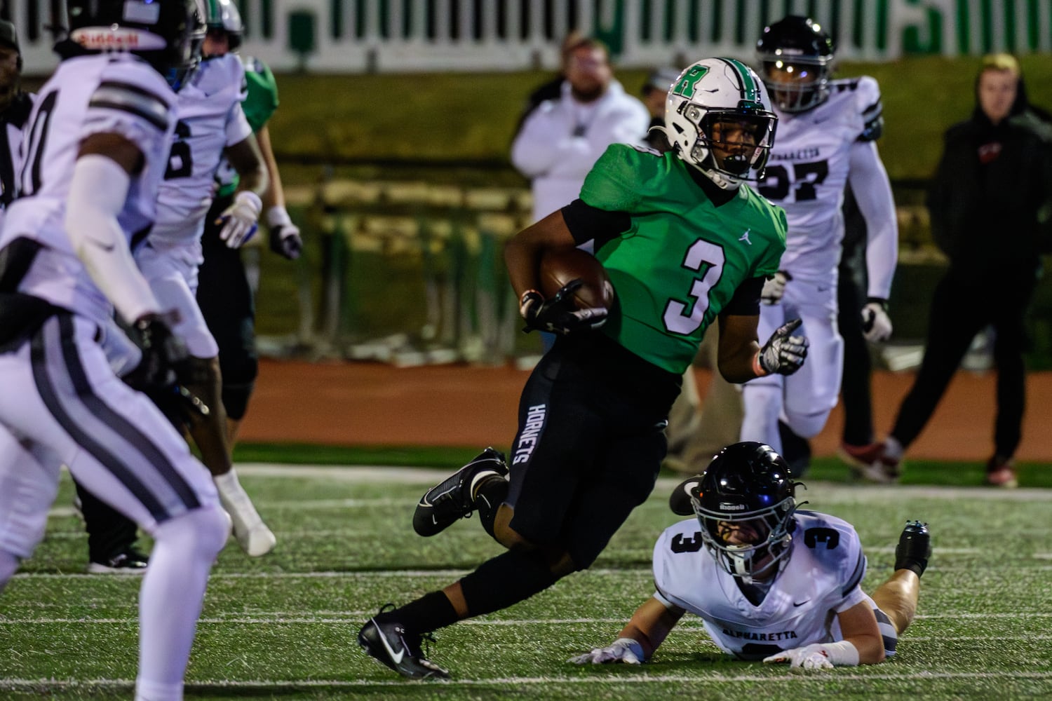 Running back Jrue Keeling finds a hole during the Alpharetta at Roswell football game, November 3, 2023. (Jamie Spaar for the Atlanta Journal Constitution)