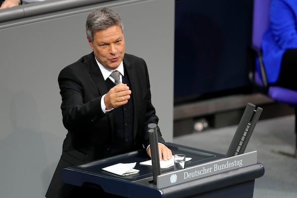 Economy and Climate Minister Robert Habeck speaks during a plenary session at the German parliament Bundestag where he faces a vote of confidence, Berlin, Germany, Monday, Dec. 16, 2024. (AP Photo/Markus Schreiber)