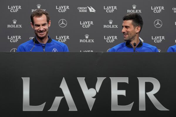 FILE - Britain's Andy Murray, left, and Serbia's Novak Djokovic attend a press conference ahead of the Laver Cup tennis tournament at the O2 in London, Thursday, Sept. 22, 2022. (AP Photo/Kin Cheung, File)