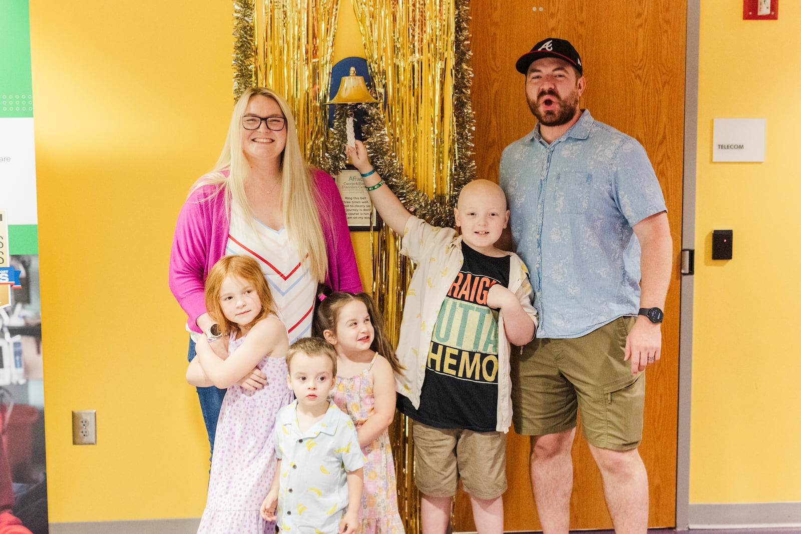 Wesley Peterson (center) ringing the bell at Children's Healthcare of Atlanta with his family on April 3, 2024, to mark the end of his cancer treatment.
Photo by Christy Hyde Photography