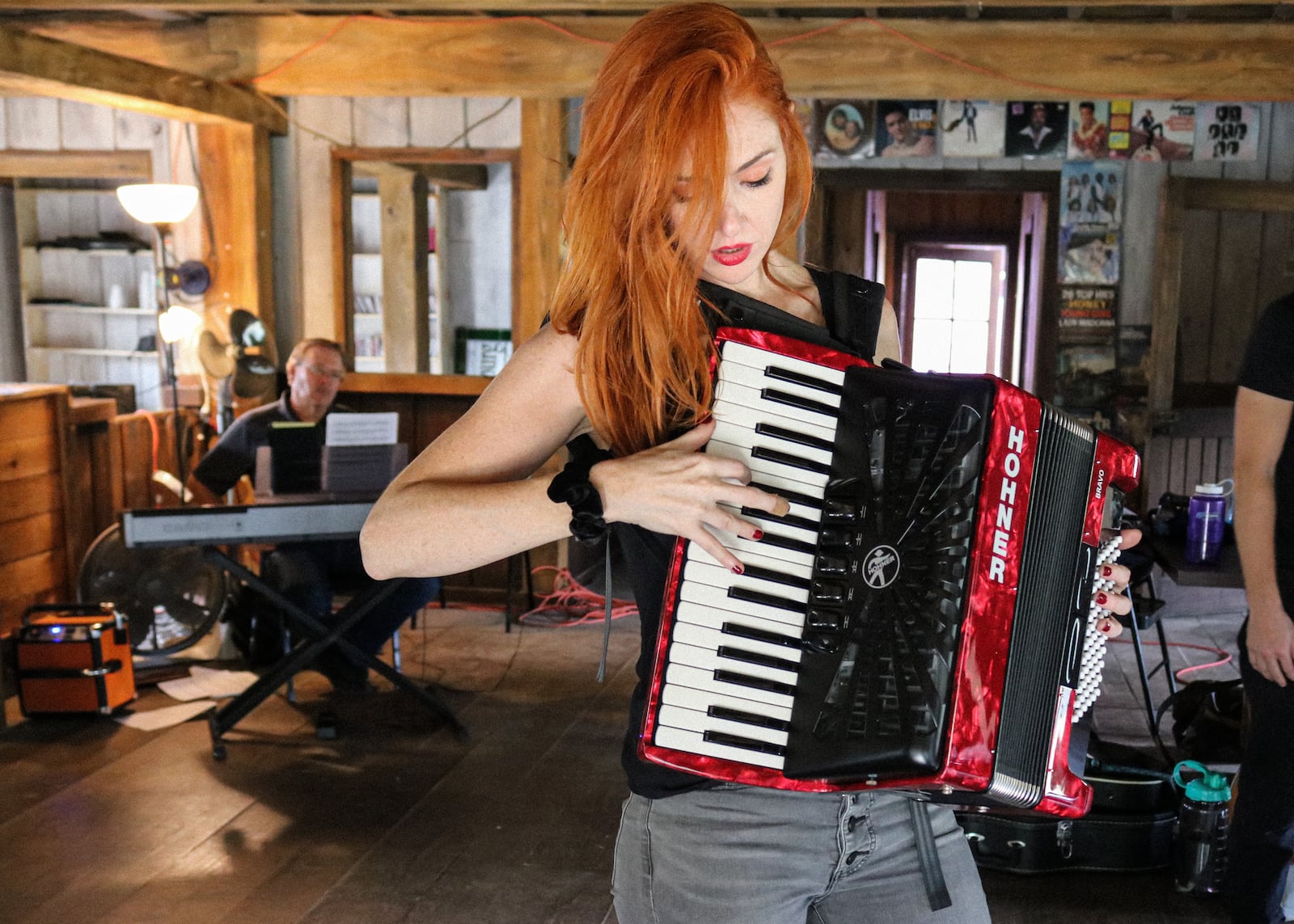 Several of the actors, including Julie Trammel, serve as members of the orchestra in the musical production "The Salem Experience." Photo: Bree Clowdus