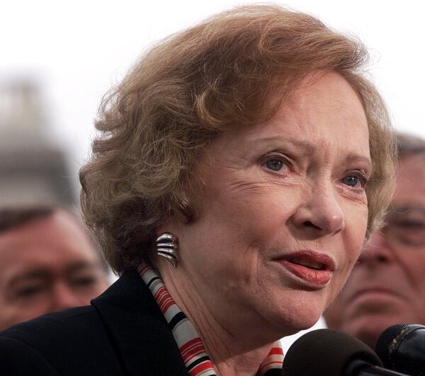 In this file photo, former first lady Rosalynn Carter appears on Capitol Hill to lobby congress for a bill that would force insurance companies to cover mental illness the same way they do physical illness.