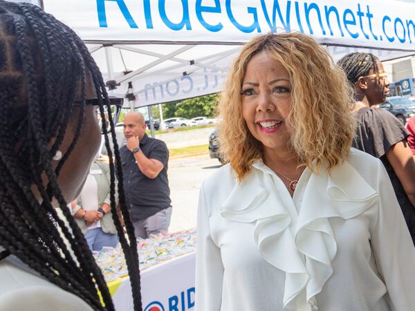 Congresswoman Lucy McBath arrives at the Gwinnett County celebration of a $20 million grant awarded to transform the transit center just west of Gwinnett Place Mall on Monday, July 24, 2023.  (Jenni Girtman for The Atlanta Journal-Constitution)