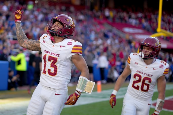 Iowa State wide receiver Jaylin Noel (13) celebrates after scoring a touchdown during the first half of an NCAA college football game against Kansas Saturday, Nov. 9, 2024, in Kansas City, Mo. (AP Photo/Charlie Riedel)