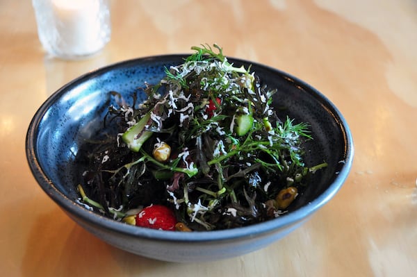 Banshee in East Atlanta Village uses strawberries to brighten its starter salad. CONTRIBUTED BY KRIS MARTINS