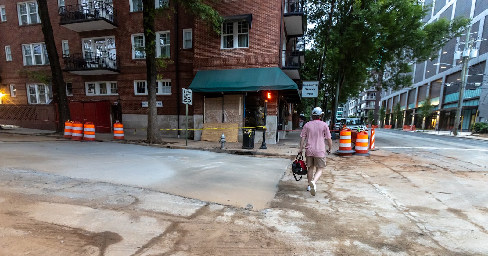 Dried Concrete was all that was left to see at the infamous 11th Street water main break Thursday morning, June 6, 2024. Thursday morning, the city announced that the boil water advisory had been lifted, six days after the ordeal began. Now, the focus is on fixing the outdated infrastructure. Atlanta Mayor Andre Dickens said he will rely on the experts and how the city will proceed. (John Spink/AJC)