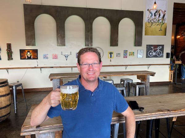 Co-owner and brewmaster Jamey Adams at the Arches taproom in Hapeville. 
(Bob Townsend for the Atlanta-Journal Constitution)