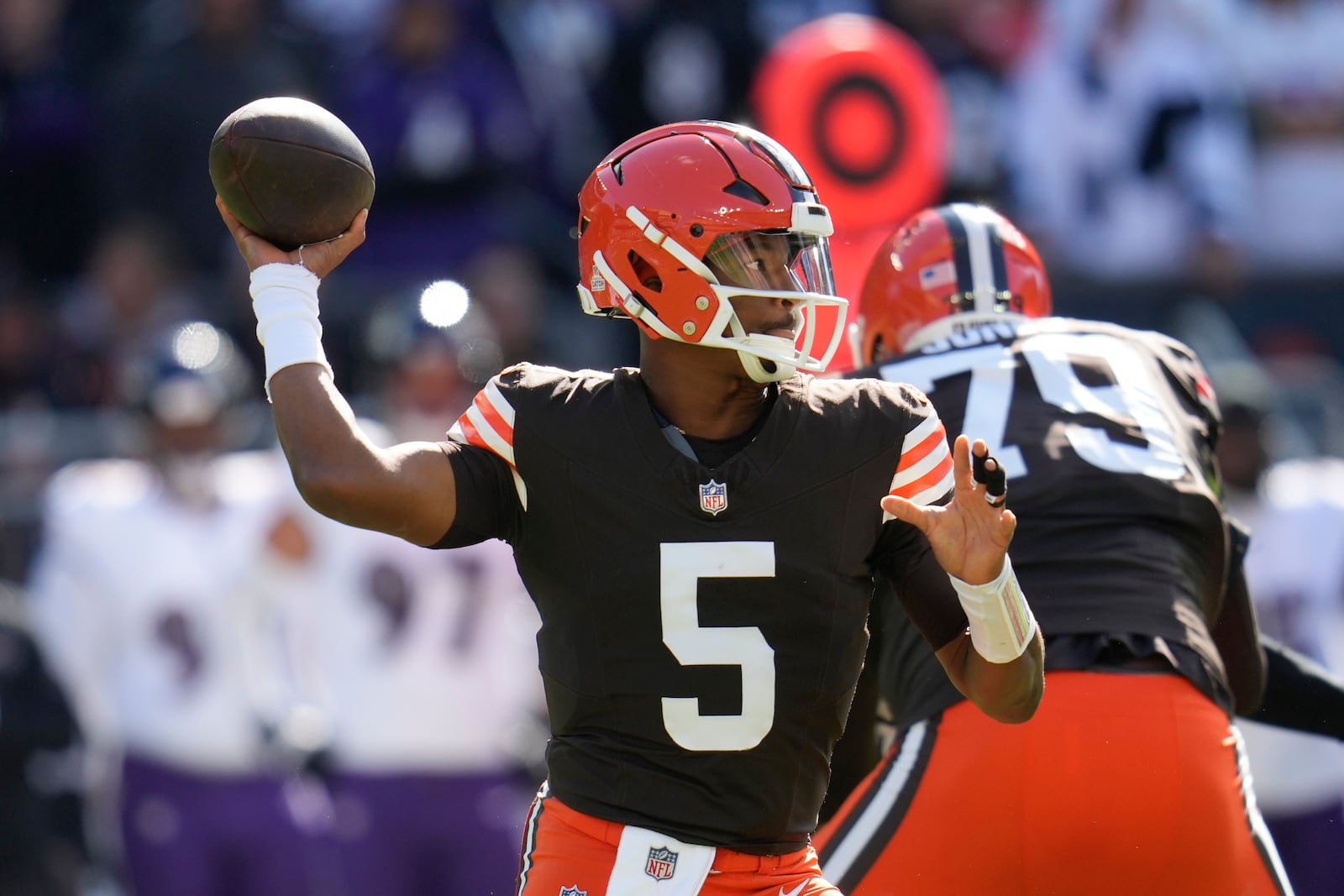 Cleveland Browns quarterback Jameis Winston (5) throws against the Baltimore Ravens during the first half of an NFL football game in Cleveland, Sunday, Oct. 27, 2024. (AP Photo/Sue Ogrocki)