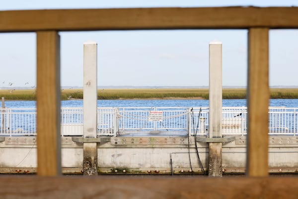 The main dock at Sapelo Island is seen with the entrance to the collapsed gangway blocked by a wooden fence on Tuesday, October 22, 2024. Saturday, people returning to the mainland fell into the water; seven died and three others were critically injured.
(Miguel Martinez / AJC)