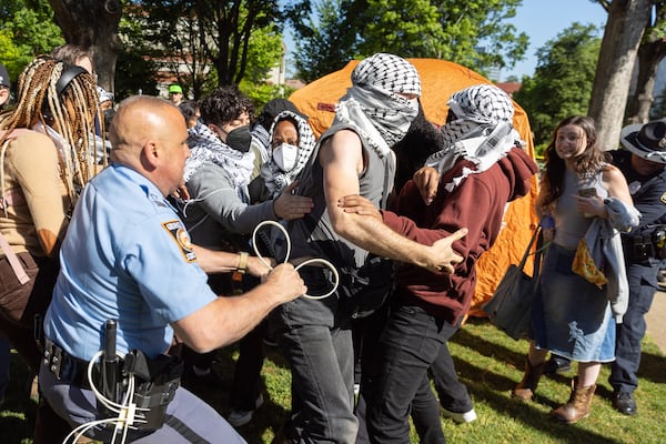 Police arrest Pro-Palestinian protestors who set up an encampment at the Emory Campus in Atlanta on Thursday, April 25, 2024. (Arvin Temkar/Atlanta Journal Constitution/TNS)