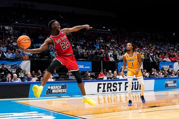 Saint Francis guard Wisler Sanon II (23) chases a loose ball during the first half of a First Four college basketball game against Alabama State in the NCAA Tournament, Tuesday, March 18, 2025, in Dayton, Ohio. (AP Photo/Jeff Dean)